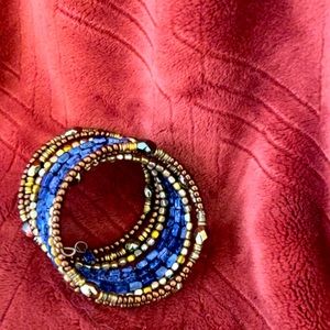 Blue and gold Maurice’s bracelet.